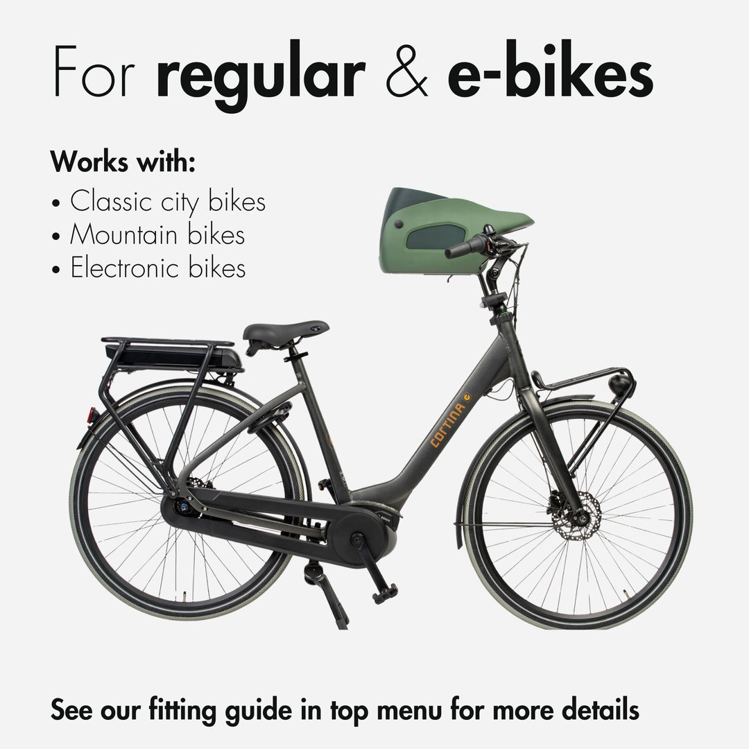 Side view of a Kvisp dog carrier in the color Midnight Gray mounted on a black Cortina ebike #color_forest-green