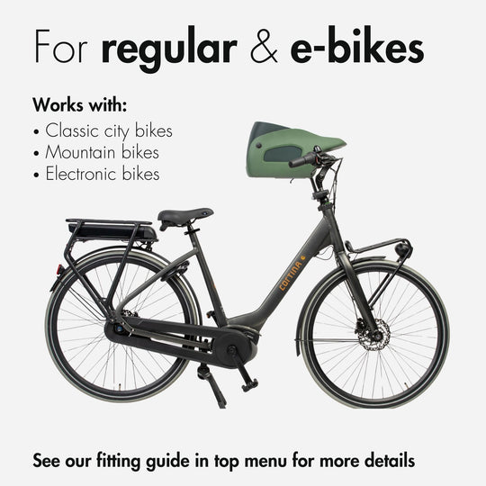 Side view of a Kvisp dog carrier in the color Midnight Gray mounted on a black Cortina ebike #color_forest-green