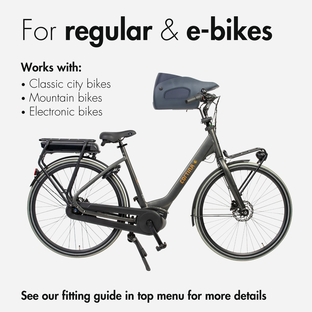 Side view of a Kvisp dog carrier in the color Midnight Gray mounted on a black Cortina ebike #color_midnight-gray