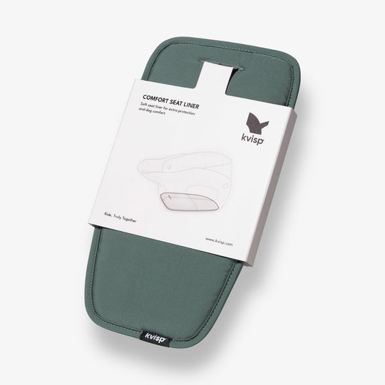 A tilted side view of the Comfort Seat Liner in the color Forest Green #color_forest-green