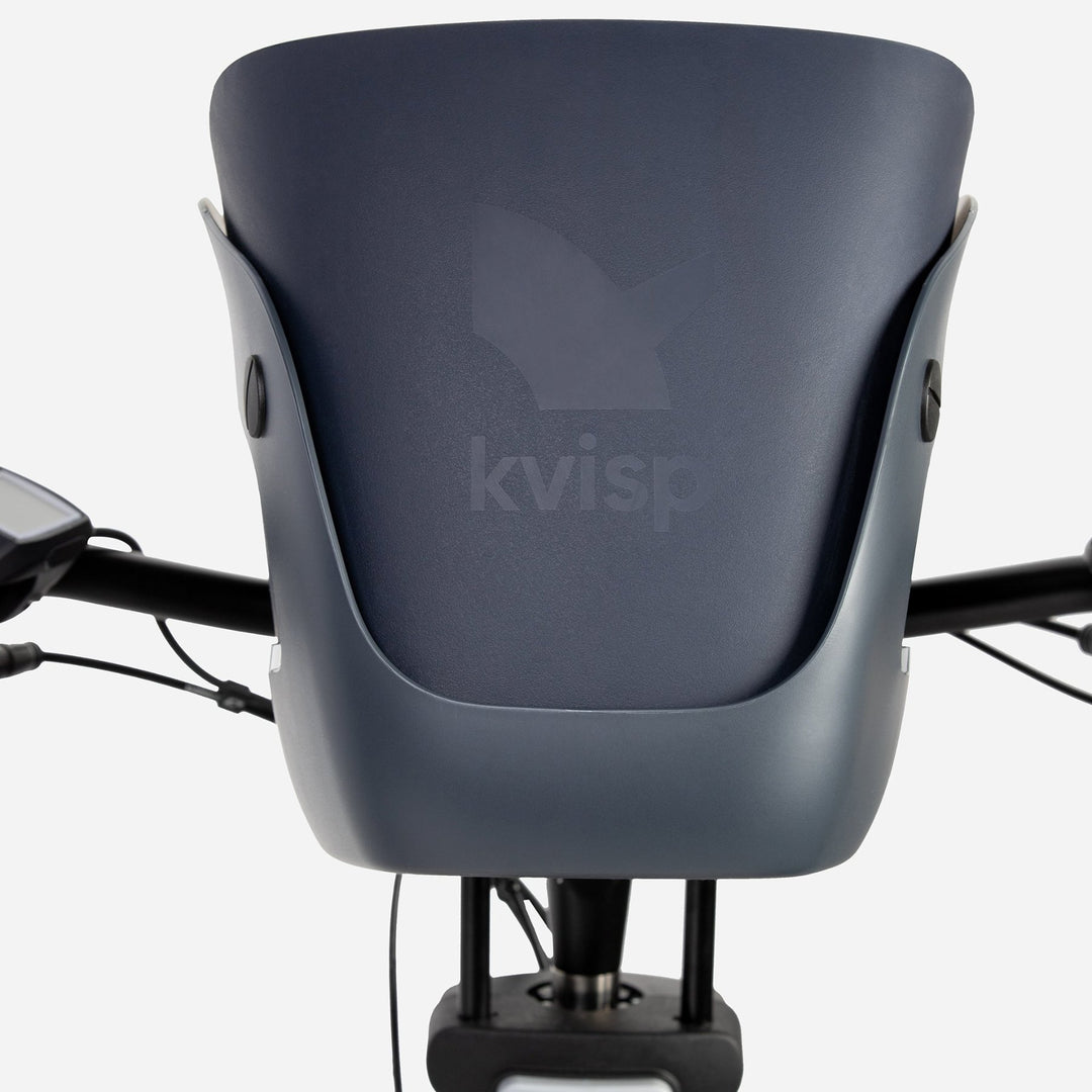 Detailed view of the backside of the Kvisp dog bike carrier mounted on an ebike showing off the nice texture and debossed Kvisp logo on the Midnight Gray seat #color_midnight-gray