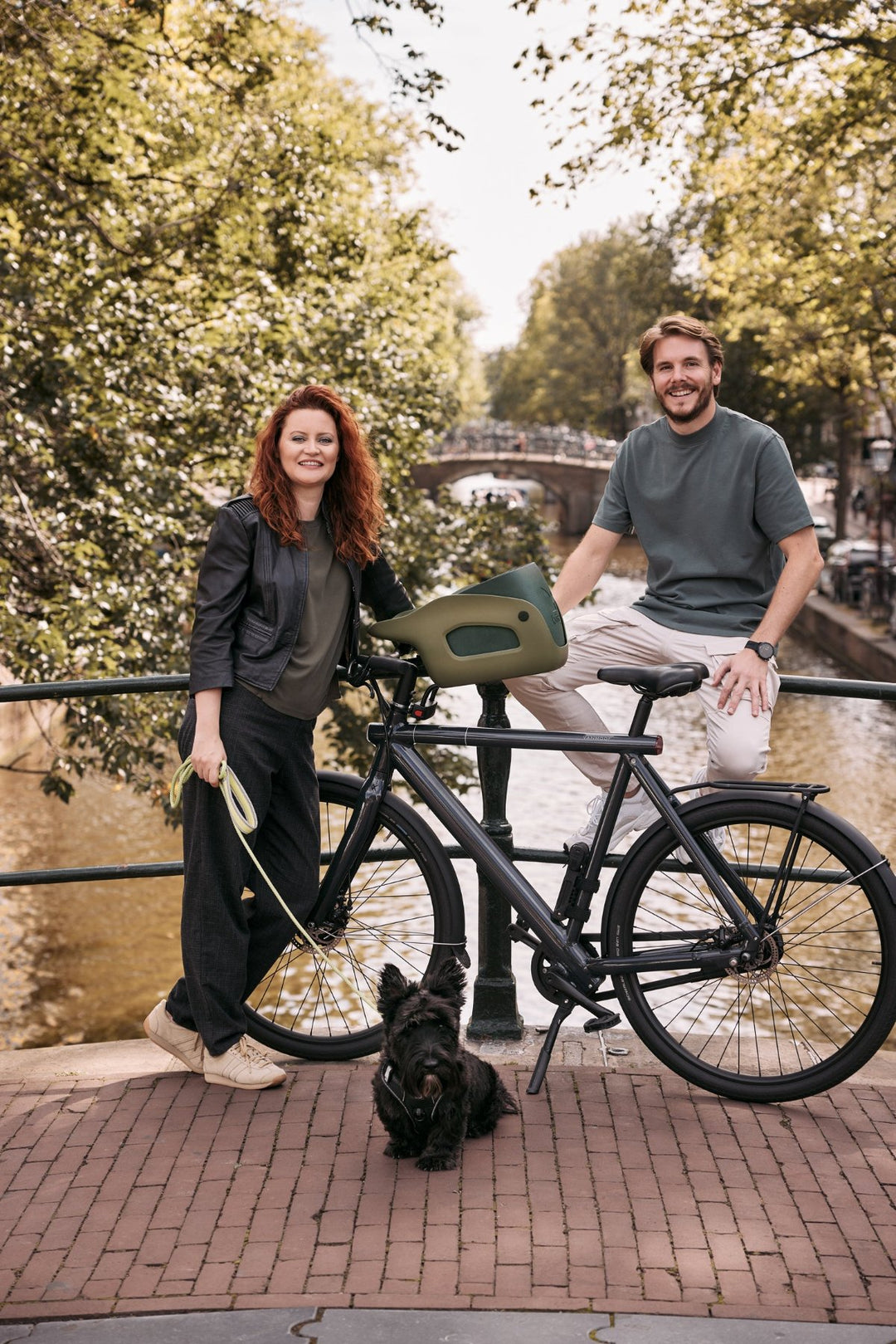 The Kvisp Team in Amsterdam with a Bike Carrier Mounted on a VanMoof