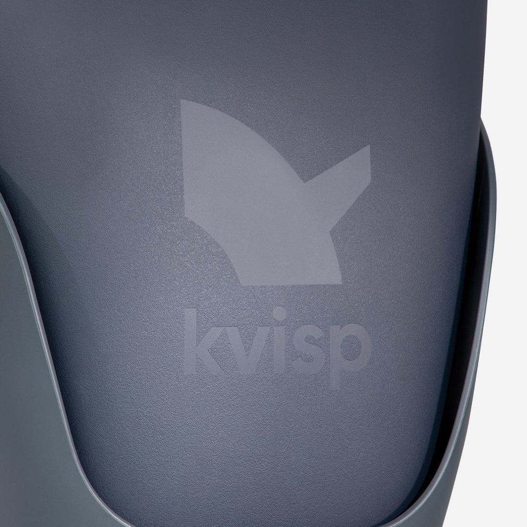 Zoomed in Kvisp dog bike carrier from the back showing off the nice texture and debossed Kvisp logo on the Midnight Gray seat #color_midnight-gray